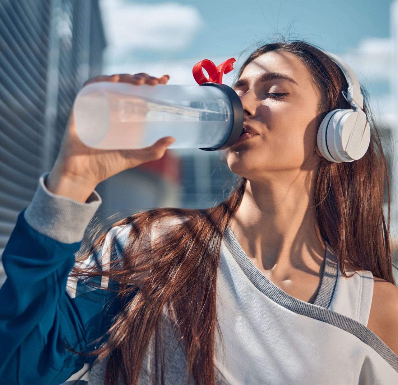 gym member drinks water at a montrose gym