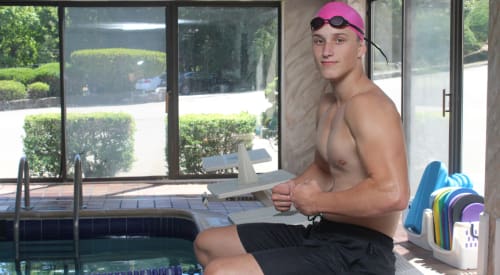 swim team member getting ready for swimming at aquatics center in montrose