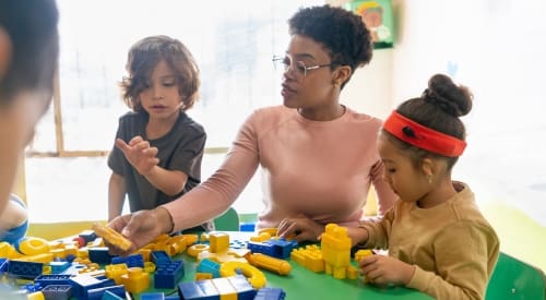 childcare staff at montrose gym near me playing with kids