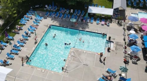 an outdoor pool in montrose at premier athletic club