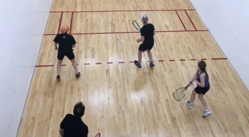 gym members during a racquetball lesson at a montrose health club