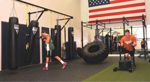 gym members training during a small group class at a montrose health club premier