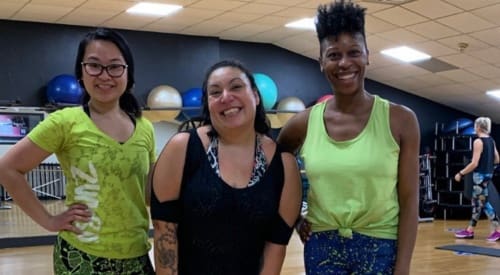 group of people enjoying a zumba class at premier athletic club in montrose